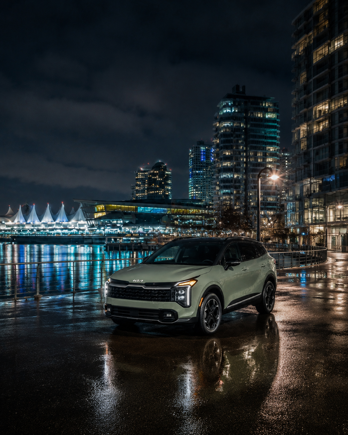 Kia SUV at the Vancouver waterfront at night
